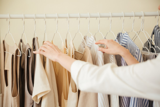 close-up-clothes-hanging-rack_171337-7196